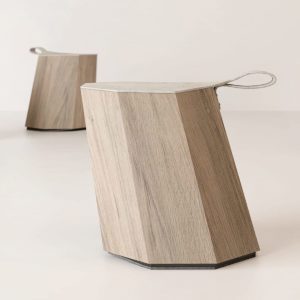 Two 8 Stools with octagonal base shape oblique extruded made of light wood and covered with felt surface and handle and dark base
