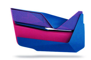 Car Interior Concept door panel in modern geometric folded shape with armrest and storage space covered with blue and pink textured fabric