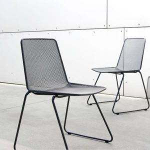 Two Haley Chairs with base in bent steel tube and seat and backrest in steel mesh in black
